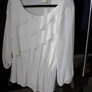White ruffled blouse